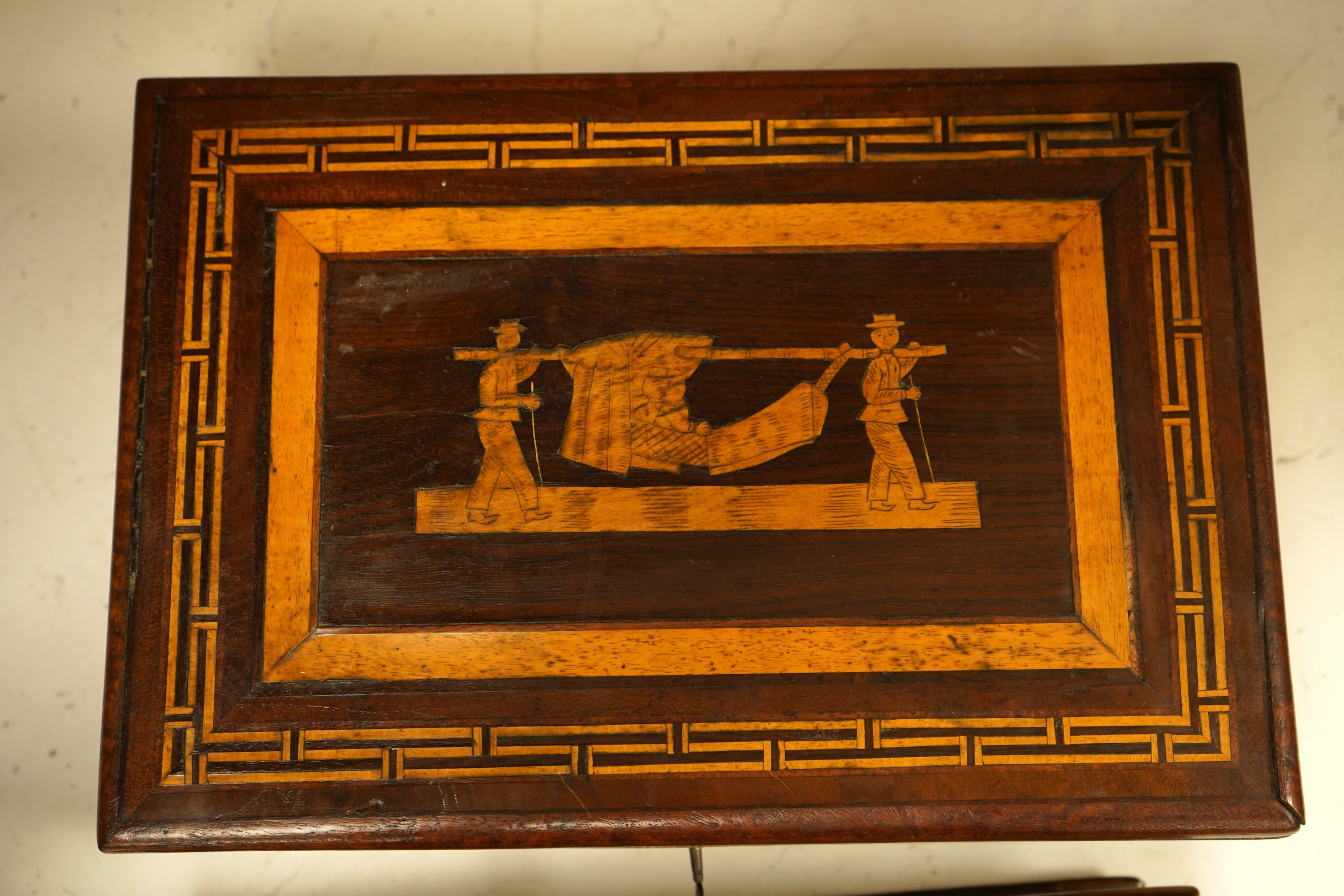 A 19th century Colonial marquetry work box, with key and an oak desk stand, 32cm wide